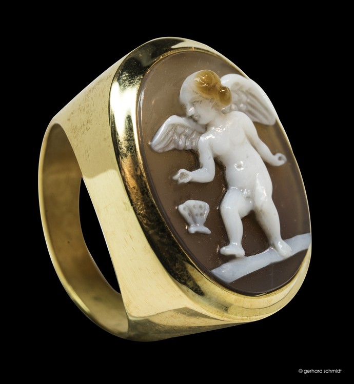 Schmetterling haschender Eros